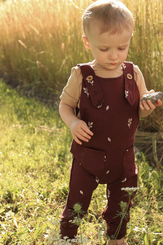 Salopette évolutive prune motif fleurs