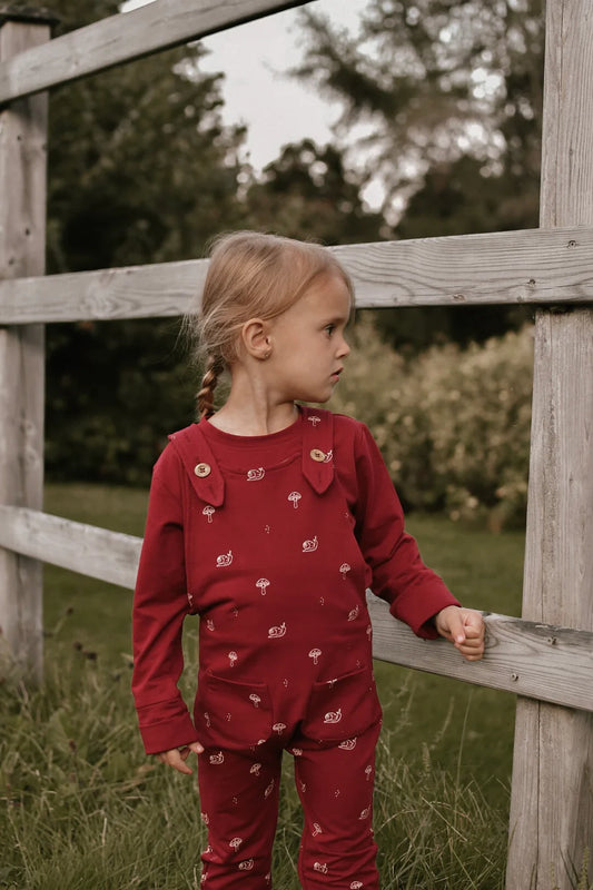 Salopette évolutive rouge cerise motif escargots